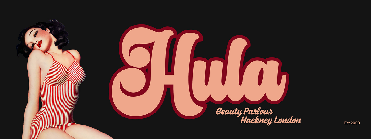 A square graphic banner with a vintage-style pin-up illustration on the left and large retro text reading 'Hula' on a black background. Smaller text below reads 'Beauty Parlour Hackney London' and 'Est 2009'.